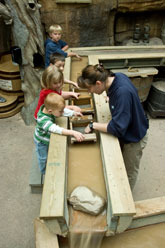 Children at an interactive learning exhibit