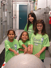 Students at an interactive exhibit