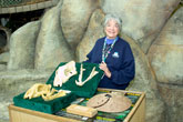 Woman showing off sea animal bones